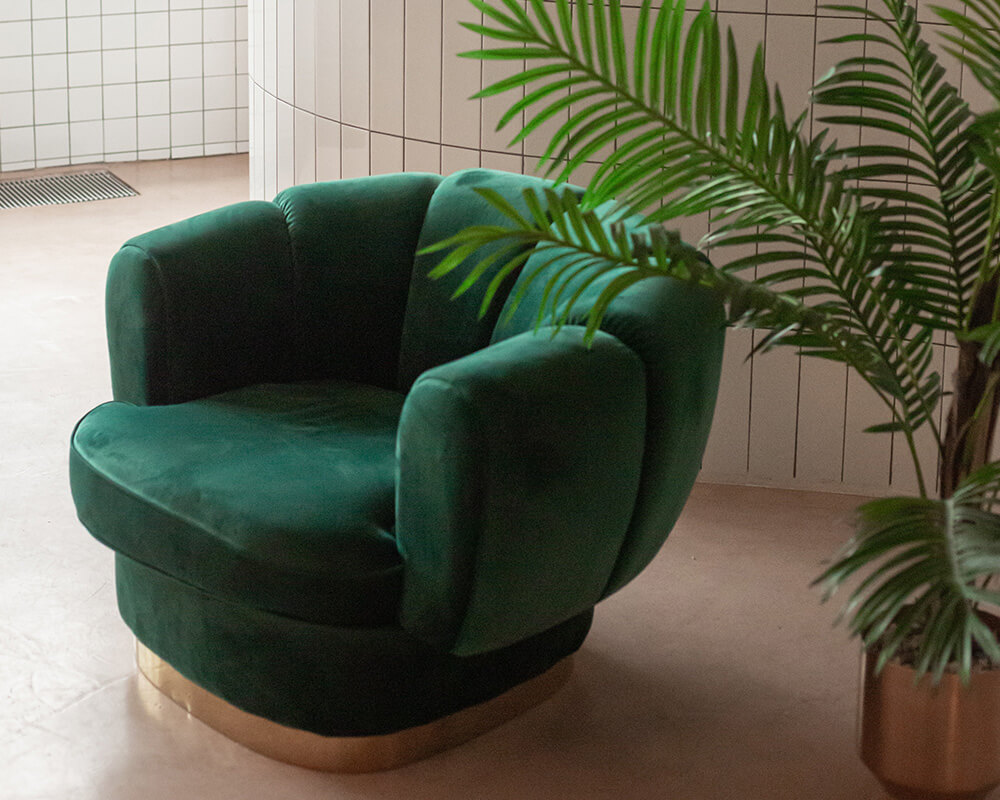 smaragdzöld dizájn fotel kényelmes kialakítás, vibráló szín
